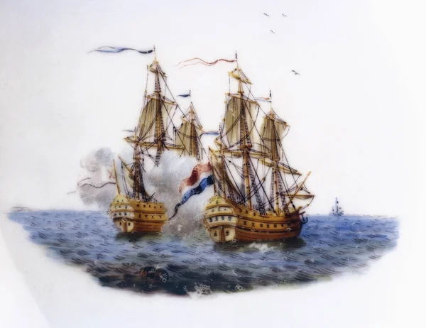 Brussels, Belgium - August 09, 2022:  Central motif of a Tournai porcelain saucer decorated with a naval combat scene
