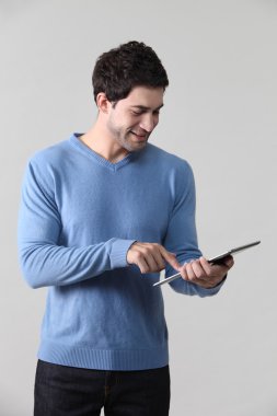 adam tutarak tablet