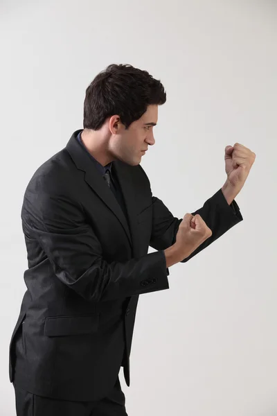 Businessman with fighting stance — Stock Photo, Image