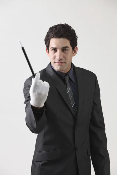 Holding magic wand — Stock Photo, Image