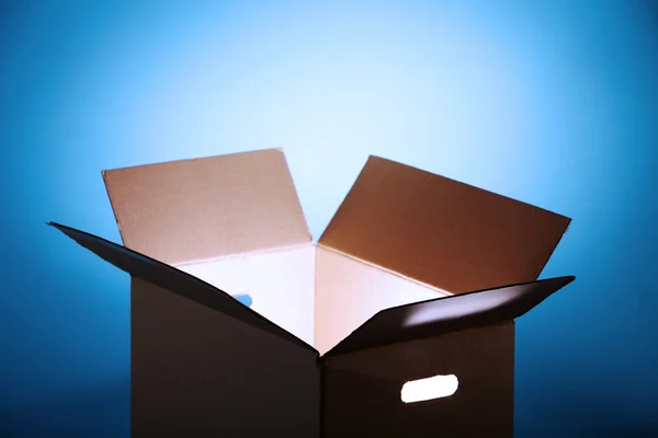 Glowing light from open box — Stock Photo, Image