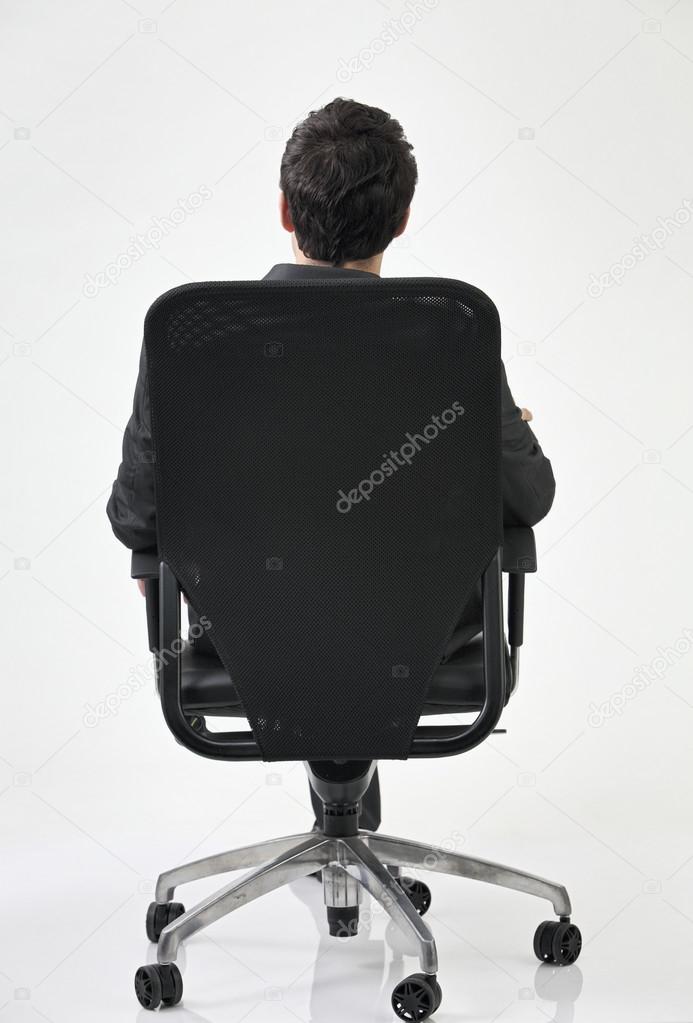 Back view of man on chair