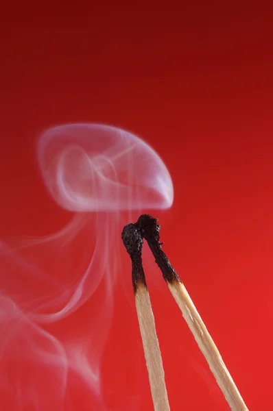 Match with smoke — Stock Photo, Image