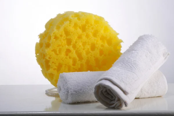 Sponge and towel — Stock Photo, Image