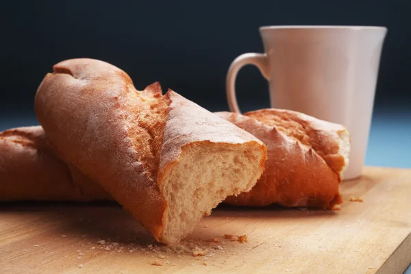 Baguette and coffee — Stock Photo, Image