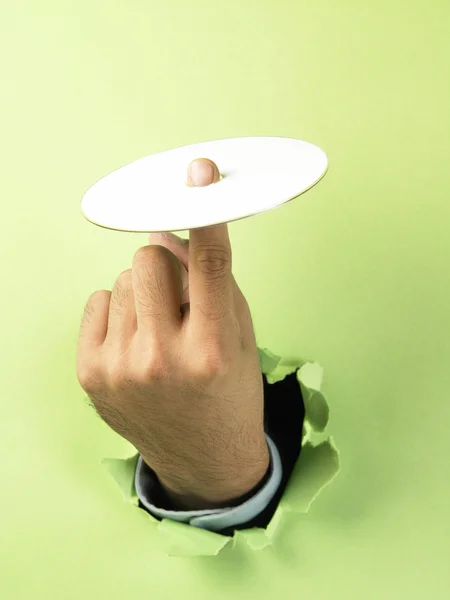 Hand holding and showing a printable cd — Stock Photo, Image