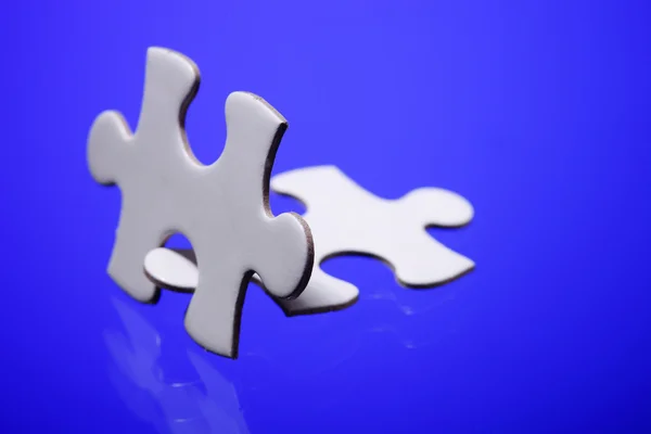 Zwei Puzzleteile zusammengefügt — Stockfoto