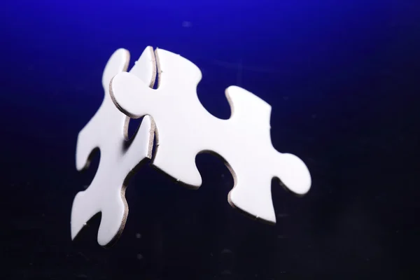 Two jigsaw puzzle parts joined together — Stock Photo, Image