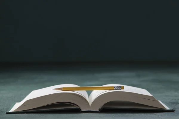 Book and pencil — Stock Photo, Image