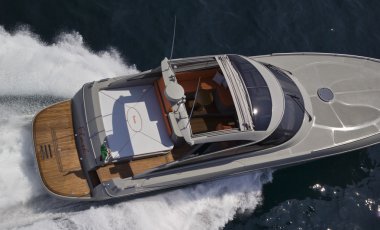 :Italy, off the coast of Naples, Flash luxury yacht (boatyard: Cantieri di Baia), aerial view clipart
