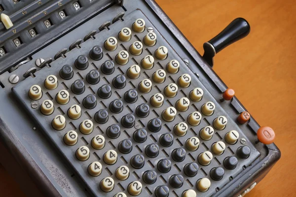 Italy, old calculator on a table — Stock Photo, Image