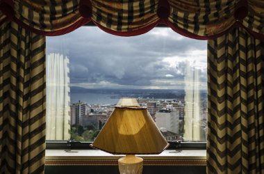 Portugal, Lisbon, view of the city and the Tagus river from an hotel window clipart