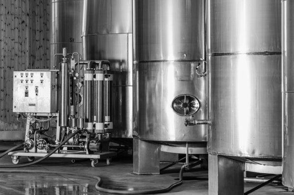 Italy, Sicily, Ragusa province, countryside, stainless steel wine containers in a wine factory