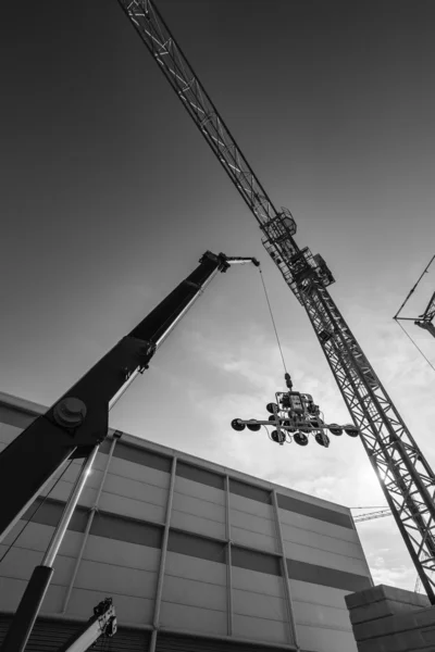 Tower cranes, glass holder — Stock Photo, Image