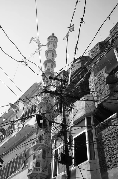 Old electric cables in a street — Stock Photo, Image