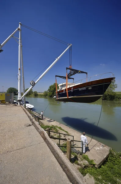 Luxury yachts ashore in a boatyard — Stock Photo, Image