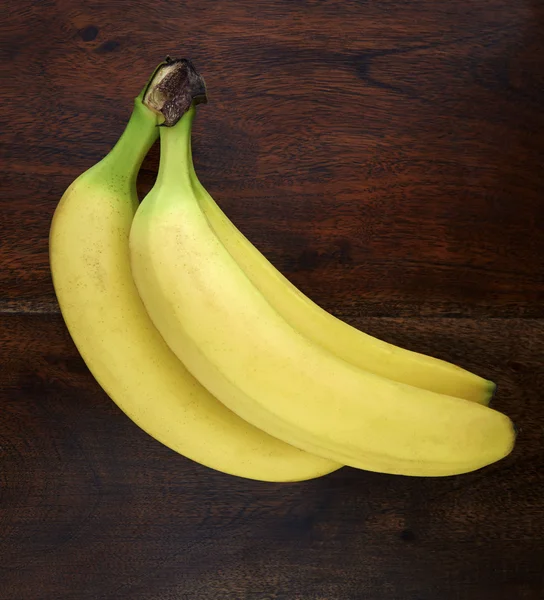 Bananas on a wooden table — Stock Photo, Image