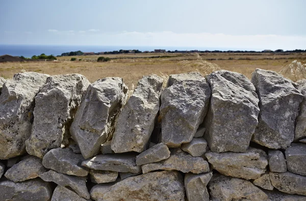 Mão típica feita parede de pedra siciliana — Fotografia de Stock