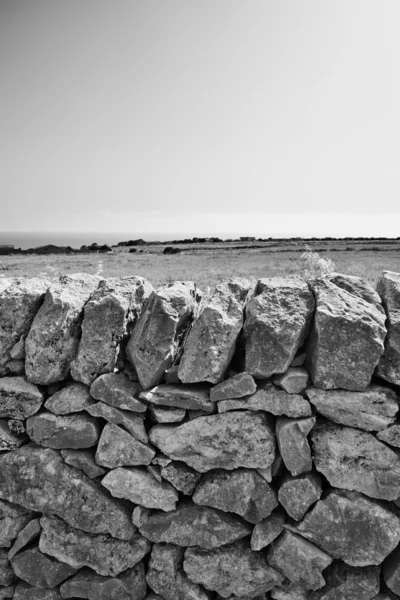 Typical hand made sicilian stone wall — Stock Photo, Image