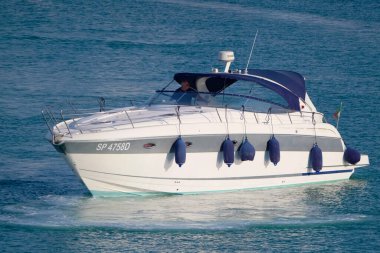 Italy, Sicily, Mediterranean Sea, Marina di Ragusa (Ragusa Province); 17 July 2022, people on a luxury yacht in the port - EDITORIAL