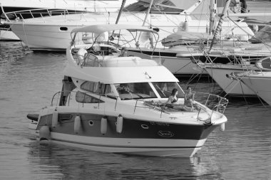 Italy, Sicily, Mediterranean Sea, Marina di Ragusa (Ragusa Province); 7 August 2022, people on a luxury yacht in the port - EDITORIAL