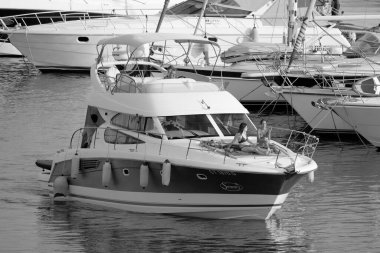 Italy, Sicily, Mediterranean Sea, Marina di Ragusa (Ragusa Province); 7 August 2022, people on a luxury yacht in the port - EDITORIAL