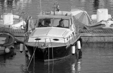 Italy, Sicily, Mediterranean Sea, Marina di Ragusa (Ragusa Province); 11 August 2022, men on a luxury yacht in the port - EDITORIAL