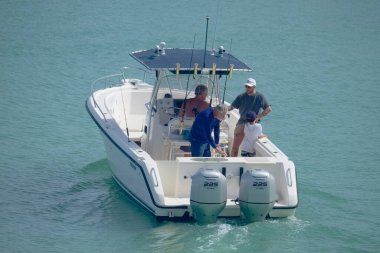 Italy, Sicily, Mediterranean Sea, Marina di Ragusa (Ragusa Province); 16 August 2022, sport fishermen on a motor boat in the port - EDITORIAL