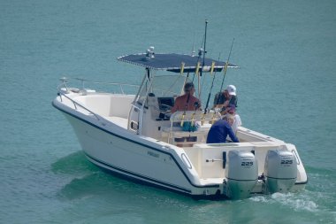 Italy, Sicily, Mediterranean Sea, Marina di Ragusa (Ragusa Province); 16 August 2022, sport fishermen on a motor boat in the port - EDITORIAL