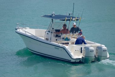Italy, Sicily, Mediterranean Sea, Marina di Ragusa (Ragusa Province); 16 August 2022, sport fishermen on a motor boat in the port - EDITORIAL