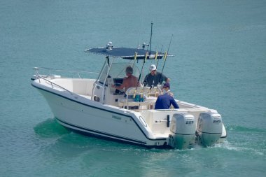 Italy, Sicily, Mediterranean Sea, Marina di Ragusa (Ragusa Province); 16 August 2022, sport fishermen on a motor boat in the port - EDITORIAL
