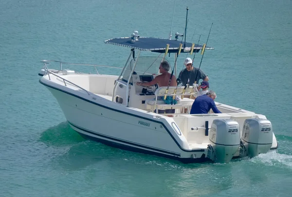 Italy, Sicily, Mediterranean Sea, Marina di Ragusa (Ragusa Province); 16 August 2022, sport fishermen on a motor boat in the port - EDITORIAL