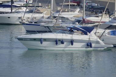 Italy, Sicily, Mediterranean Sea, Marina di Ragusa (Ragusa Province); 17 August 2022, people on a luxury yacht in the port - EDITORIAL