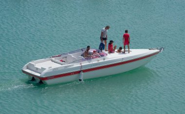 Italy, Sicily, Mediterranean Sea, Marina di Ragusa (Ragusa Province); 22 August 2022, people on a luxury yacht in the port - EDITORIAL