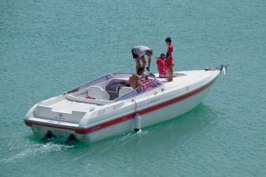 Italy, Sicily, Mediterranean Sea, Marina di Ragusa (Ragusa Province); 22 August 2022, people on a luxury yacht in the port - EDITORIAL