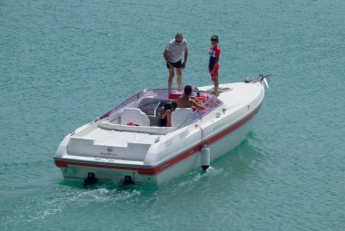 Italy, Sicily, Mediterranean Sea, Marina di Ragusa (Ragusa Province); 22 August 2022, people on a luxury yacht in the port - EDITORIAL