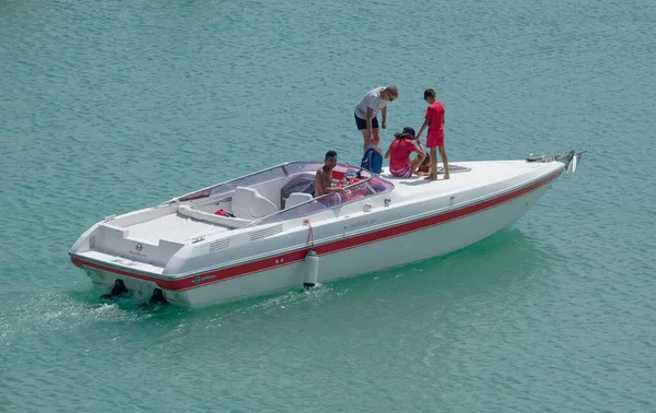Italy, Sicily, Mediterranean Sea, Marina di Ragusa (Ragusa Province); 22 August 2022, people on a luxury yacht in the port - EDITORIAL