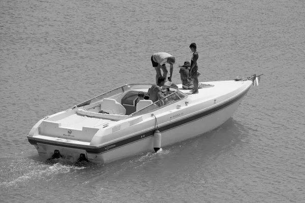 Italy, Sicily, Mediterranean Sea, Marina di Ragusa (Ragusa Province); 22 August 2022, people on a luxury yacht in the port - EDITORIAL