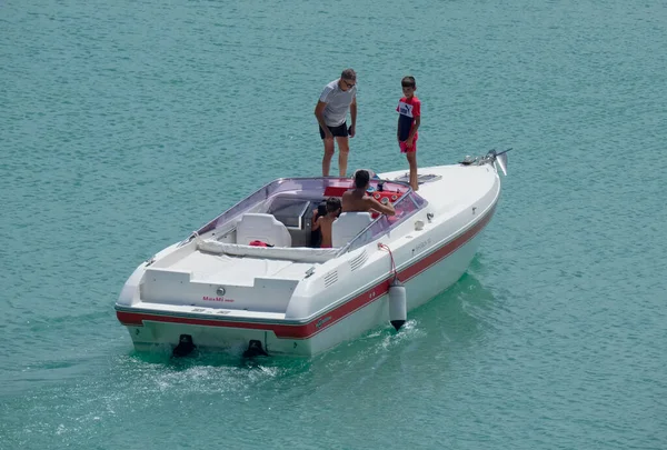 Italy, Sicily, Mediterranean Sea, Marina di Ragusa (Ragusa Province); 22 August 2022, people on a luxury yacht in the port - EDITORIAL