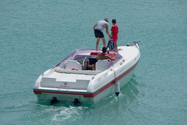 Italy, Sicily, Mediterranean Sea, Marina di Ragusa (Ragusa Province); 22 August 2022, people on a luxury yacht in the port - EDITORIAL