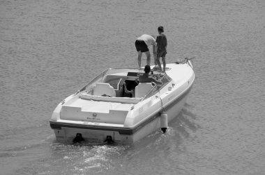 Italy, Sicily, Mediterranean Sea, Marina di Ragusa (Ragusa Province); 22 August 2022, people on a luxury yacht in the port - EDITORIAL