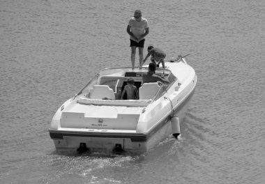 Italy, Sicily, Mediterranean Sea, Marina di Ragusa (Ragusa Province); 22 August 2022, people on a luxury yacht in the port - EDITORIAL