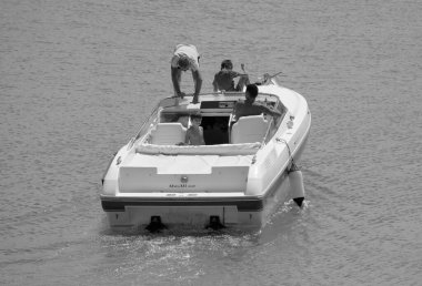 Italy, Sicily, Mediterranean Sea, Marina di Ragusa (Ragusa Province); 22 August 2022, people on a luxury yacht in the port - EDITORIAL