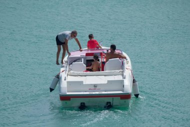 Italy, Sicily, Mediterranean Sea, Marina di Ragusa (Ragusa Province); 22 August 2022, people on a luxury yacht in the port - EDITORIAL