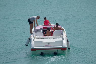 Italy, Sicily, Mediterranean Sea, Marina di Ragusa (Ragusa Province); 22 August 2022, people on a luxury yacht in the port - EDITORIAL