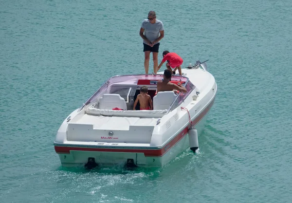 Italy, Sicily, Mediterranean Sea, Marina di Ragusa (Ragusa Province); 22 August 2022, people on a luxury yacht in the port - EDITORIAL