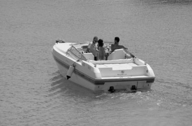 Italy, Sicily, Mediterranean Sea, Marina di Ragusa (Ragusa Province); 22 August 2022, people on a luxury yacht in the port - EDITORIAL