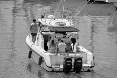 Italy, Sicily, Mediterranean Sea, Marina di Ragusa (Ragusa Province); 25 August 2022, people on a luxury yacht in the port - EDITORIAL