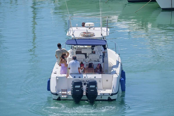 Italy, Sicily, Mediterranean Sea, Marina di Ragusa (Ragusa Province); 25 August 2022, people on a luxury yacht in the port - EDITORIAL
