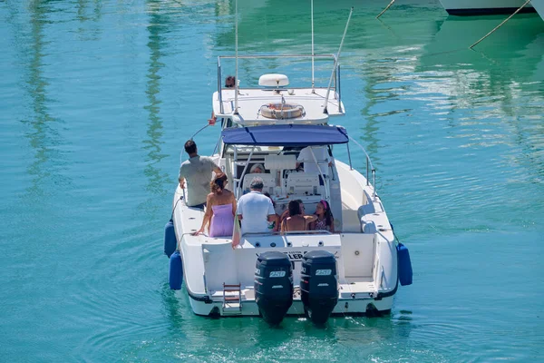 Italy, Sicily, Mediterranean Sea, Marina di Ragusa (Ragusa Province); 25 August 2022, people on a luxury yacht in the port - EDITORIAL